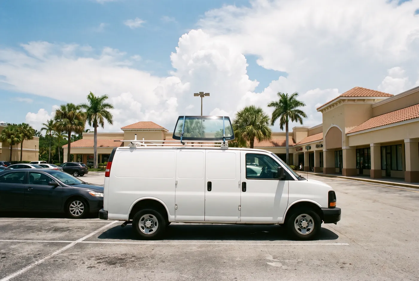 Mobile auto glass van with a windshield ready for a job in Cocoa