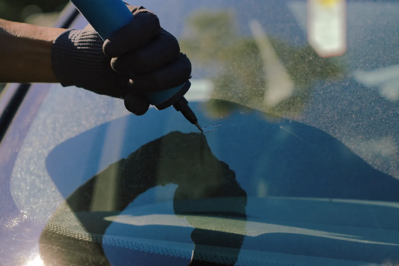 Rock chip being repaired on a windshield in Cocoa, FL